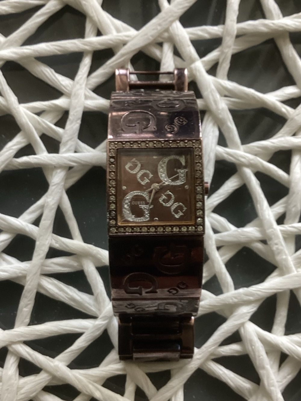 1990,s Vintage quartz ladies watch by Guess. Gold encrusted with zircons.